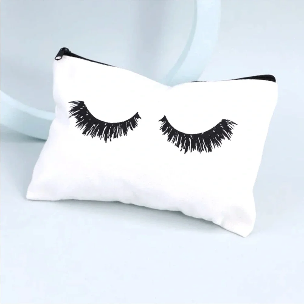 FREE 💫 Eyelash Print Canvas Cosmetics Makeup Bag in White